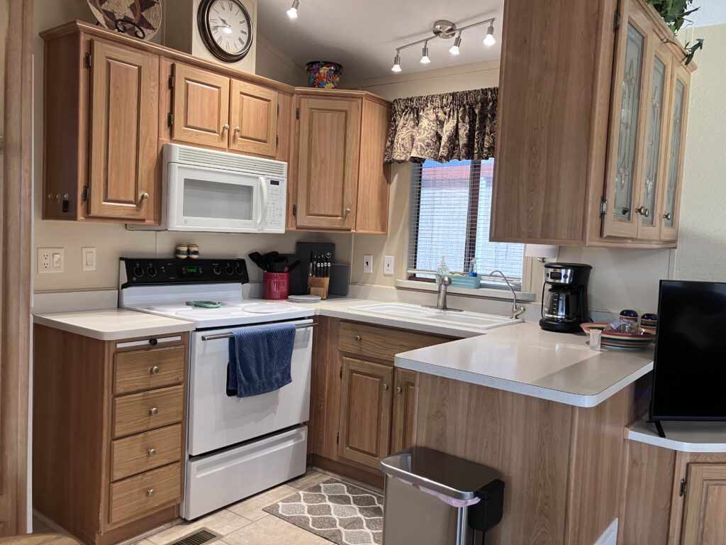 All electric kitchen with toaster, coffee maker, reverse osmosis filtered drinking water. 